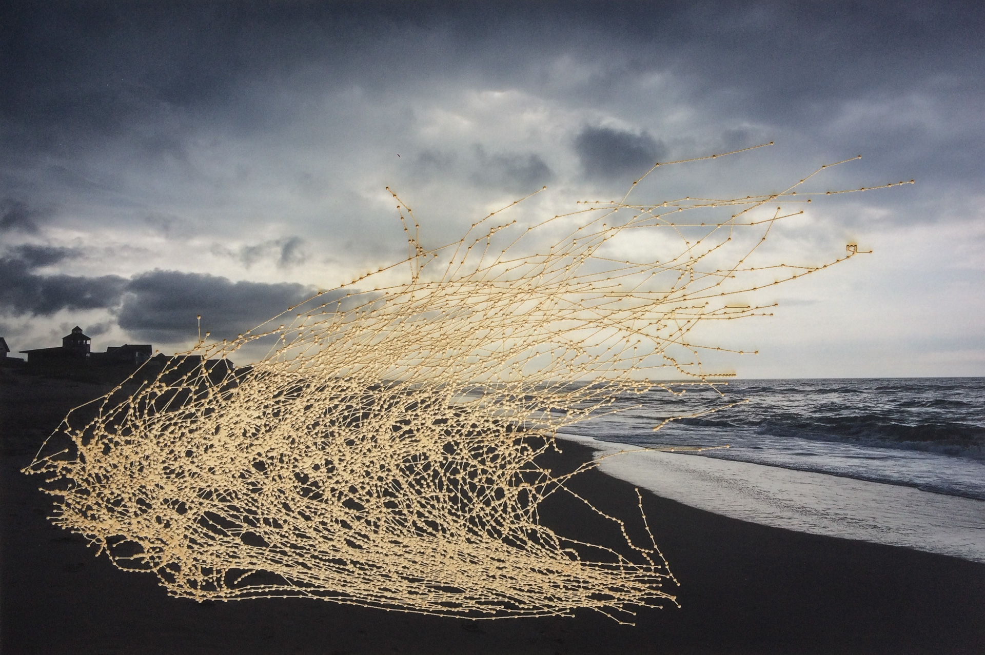 A coastal sunset with paths of hurricanes carved across it